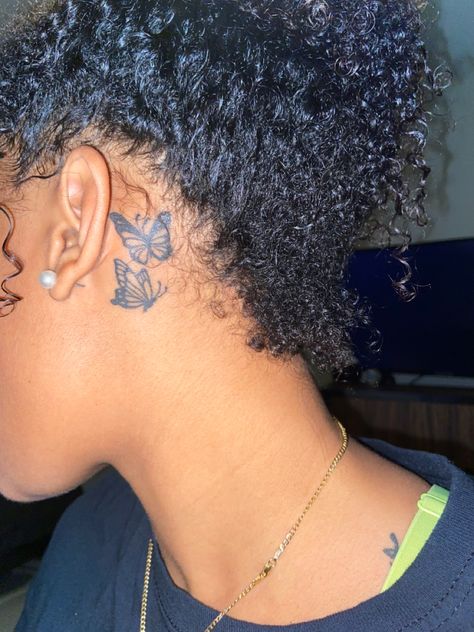 Butterfly Tattoo Behind Ear With Words, Purpose Tattoo Neck, Behind Ear Tattoo Black Women, Behind The Ear Tattoo Ideas Rose, Behind The Ear Tattoo Ideas Black Women, Small Butterfly Tattoo Behind Ear, Butterfly Ear Tattoo, Dainty Behind The Ear Tattoo, White Butterfly Tattoo On Dark Skin