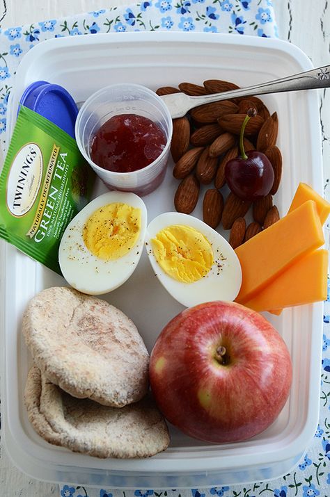 1 Hard-Boiled Egg; 3 Small Slices Cheese (about 3/4 oz); 1 Handful Unsalted Almonds (about 1 1/2 oz):  I also like walnuts, cashews, and sunflower seeds; 1 Apple:  Any piece of whole fruit will do; 2 Mini Whole Wheat Pitas:  Any healthy carb is perfect; 1 Tablespoon All-Fruit Jam:  This is optional – just for spreading on your bread; Green Tea; 1 Cherry Menu Sarapan Sehat, Healthy Breakfast On The Go, Breakfast Low Carb, Healthy Breakfasts, Diet Vegetarian, Breakfast On The Go, Health Breakfast, Health Snacks, High Protein Recipes