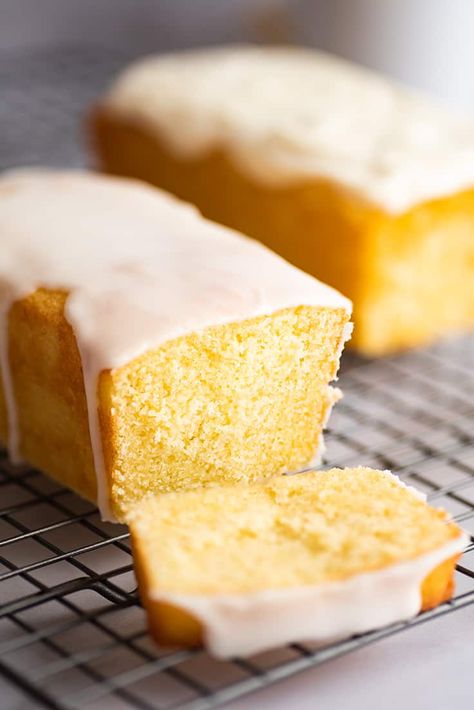 Incredibly moist and tangy Small Lemon Pound Cake that makes two adorable mini loaves. | #LemonDesserts | #PoundCake | #SmallBatch | Mini Loaf Cakes, Butter Pound Cake, Moist Lemon Cake, Lemon Pound Cake Recipe, Small Batch Baking, Glaze For Cake, Pound Cake Recipe, Lemon Loaf, Dessert For Two