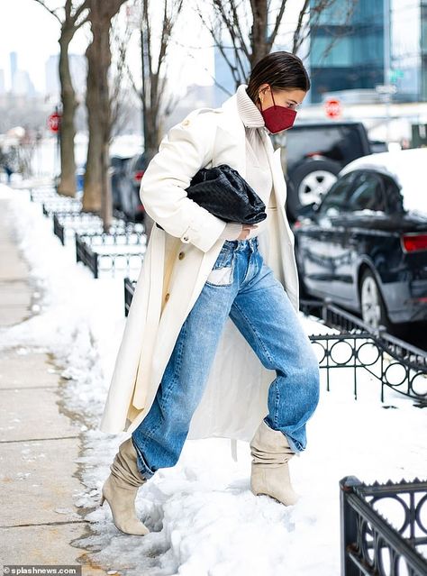 Hailey Bieber wraps up warm in a cream coat and blue jeans during outing in NYC  | Daily Mail Online Slouchy Boots Outfit, Slouchy Suede Boots, Suede Boots Outfit, Cream Coat, Mask Style, Slouchy Boots, Paris Texas, Street Style Winter, Hailey Baldwin