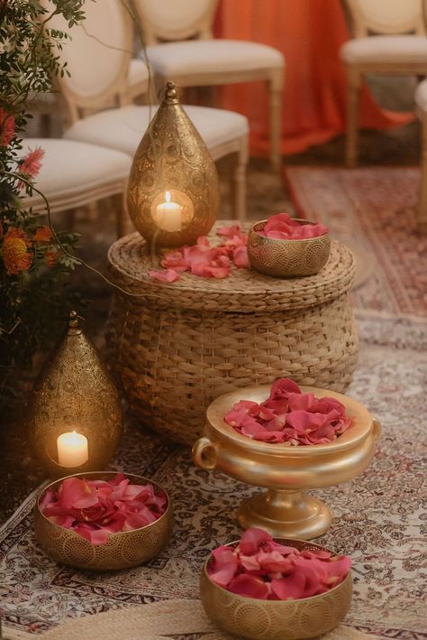 red petals for a Hindu wedding ceremony in a wicker basket with intricate gold lantern and pot Chunni Ceremony Decor, Elegant Diwali Decor, Simple Indian Wedding, Choora Ceremony, Colourful Wedding Flowers, Nikkah Decor, Ambience Decor, Lantern Decorations, Hindu Wedding Decorations