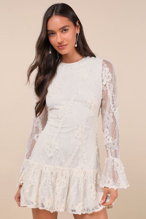 Darling Era Ivory Lace Applique Long Sleeve Ruffled Mini Dress Feminine Lace Dress, Ruffled Lace Dress For Garden Party, Chic Lace Wedding Dress With Ruffles, Neutral Tone Dress, Spring Fitted Lace Dress With Lace Cuffs, Feminine Lace Dress With Ruffles For Brunch, White Lace Dress With Lace Cuffs For Spring, Garden Party Lace Dress With Ruffles, Off White Lace Dress With Ruffles