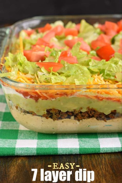 The Ultimate 7 Layer Dip recipe is packed with layers of Cream Cheese, Sour Cream, Ground Beef (and/or Beans), Guacamole, Salsa, Cheese, and more! #tacodip #superbowl #7layerdip Cheese Dip Recipes Easy, Layer Dip Recipe, 7 Layer Dip Recipe, Mexican Layer Dip, Cream Cheese Recipes Dip, Layered Dip Recipes, Layered Bean Dip, 7 Layer Dip, Nacho Dip