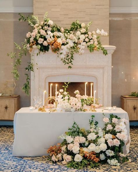 SBS Weddings & Events on Instagram: "We wouldn’t mind a seat at this table 😍 First images are in from K+K’s wedding and we’re in love! Sweetheart dreams brought to you by @kaleidoscopefloral 🌿 Can’t wait to share more from this beautiful day! • • • Planning + design: @sbsweddings Photography: @trenholmphoto Florals: @kaleidoscopefloral Rentals: @treasuryrentals @trinityspecialeventrentals @party_time_rentals_naples Linens: @bbjlinen Entertainment: @wileyentertainment Hair + makeup: @naple Mantel Floral Arrangements, Bone Table, Wedding Mantle, Classic Vintage Wedding, White Tablescape, Table Floral Arrangements, Sweetheart Table Wedding, Wedding Table Linens, Classic Wedding Decorations