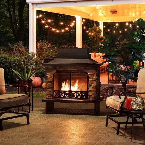 Outdoor fireplace ideas – modern and trad designs in stone, brick, with gas or wood | Real Homes Natural Gas Outdoor Fireplace, Outdoor Wood Burning Fireplace, Outdoor Structure, Patio Fireplace, Wood Pergola, Wood Burning Fire Pit, Wood Burning Fires, Patio Gazebo, Wood Patio