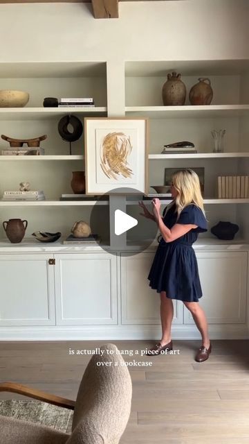 Studio McGee on Instagram: "One of my favorite styling tips for displaying art is to hang a piece over a built-in. It feels like you're breaking a rule, but it always leads to a beautiful result. #SMHoustonEstate" Mcgee And Co Shelves, Studio Mcgee Built Ins, Studio Mcgee Shelf Styling, Mcgee And Co, Shea Mcgee, Studio Mcgee, Shelf Styling, Wood Work, Art Display