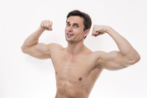 Portrait of man flexing arms Free Photo | Free Photo #Freepik #photo #freebackground #freecamera #freeman #freesport Arm Flexing Reference, Man Flexing Reference, Arm Flex Pose, Flexing Arm Reference, Flexing Reference, Flexing Pose Reference, Flexing Pose, Men Flexing, Arm Flexing