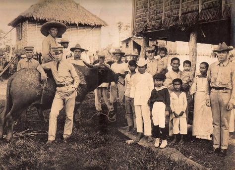 American Servicemen posing with a Carabao and with the locals in a township / sitio. undated, probably either in Lucena or in Tayabas. - simoun (image: Cpl. Joseph W. Kwiatkoski Company D, 9th Infantry US Army) Post Colonial Period In The Philippines, Pananakop Ng Espanyol Sa Pilipinas, American Period In The Philippines, Philippine Society, Primary Sources Activities, Filipino History, Agriculture Pictures, Philippines Manila, Philippine Government