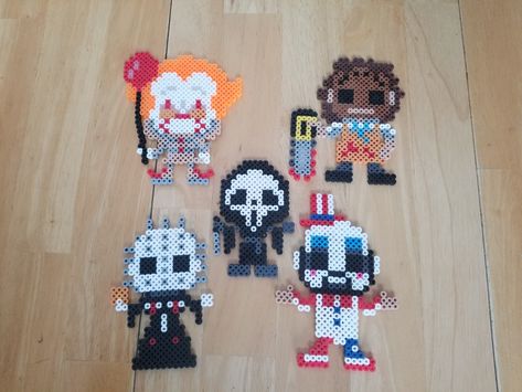 Perler beads Leather Face Scream It the clown Horror Perler Beads Ideas Horror, It Perler Beads, Hama Beads Horror, Wednesday Addams Perler Beads, Pennywise Perler Beads, Scream Perler Bead Patterns, Horror Movie Perler Beads, Halloween Fuse Beads, Ghostface Perler Beads