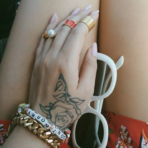 pin | bellaxlovee ☆ Alexa Demie Hand Tattoo, Lana Hand Tattoo, Tattoo Aesthetic Girl Hand, Ariana Grande's Hand Tattoos, Single Rose Tattoos, Cute Tattoos On Wrist, Rose Hand Tattoo, Hand Tattoos For Girls, Kali Uchis