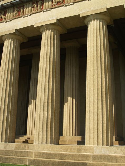 The Parthenon in Nashville's Centennial Park is a full-scale copy of the original Greek Parthenon; it was initially built in 1897 as part of the Tennessee Centennial Exposition of plaster, wood, and brick. In 1920 the Parthenon was rebuilt on the same foundations, in concrete, in a project that was completed in 1925; the interior was completed in 1931. Greek Parthenon, Wood And Brick, Parthenon Nashville, Greece Architecture, Architecture Classic, Doric Column, Greek Columns, The Parthenon, Ancient Greek Art