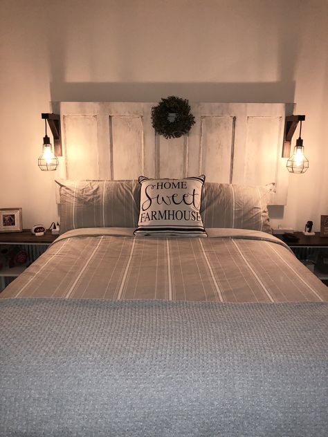 Barndoor Headboard With Lights, Bed Headboard With Lights, Farmhouse Door Headboard, Lights On Headboard Diy, Lamps On Headboard, Diy Lighted Headboard, Farmhouse Headboard With Lights, Rustic Headboard With Lights, King Headboard Ideas Master Bedrooms Diy