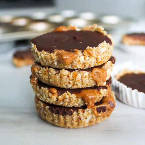 Chocolate Almond Butter Oat Cups Almond Butter Chocolate Oat Cups, Almond Butter Oat Cups, Healthy Room Temperature Snacks, Gluten Free Oat Desserts, Almond Butter Healthy Snacks, Oat Based Desserts, Almond Butter Recipe Breakfast, Healthy Individual Desserts, Almond Butter Dessert Recipes