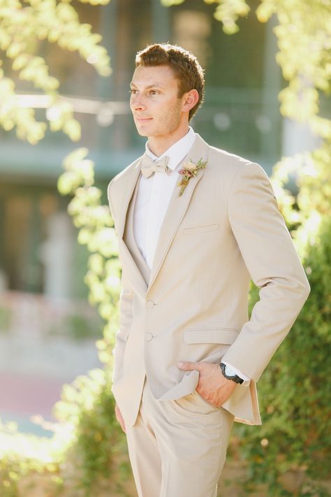 Cream grooms suit with bowtie Tan Suit With Bow Tie, Cream Suit For Groom, Pastel Color Suits For Men, Creme Tuxedo, Cream Tuxedo Wedding, Cream Suit Men Wedding, Cream Groom Suit, Cream Color Suit, Cream Wedding Suit