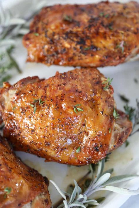 the best turkey thighs in air fryer recipe with sauce on a white plate Bone In Turkey Thigh Recipe, Turkey Thighs Recipe, Air Fryer Turkey Recipes, Turkey Thigh Recipes, Roasted Turkey Thighs, Turkey Thigh, Turkey Bacon Recipes, Seasoned Turkey, Easy Tasty Recipes