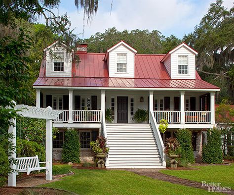 Built in 1859, this three-story clapboard house received a thoughtful renovation and tailored makeover: http://www.bhg.com/home-improvement/remodeling/before-and-after/house-tour-returning-to-the-original/?socsrc=bhgpin040715riversidehaven Exterior Remodel Before And After, Farmhouse Front Porches Decorations, Riverside House, Georgia Homes, Farmhouse Front Porches, Roof Styles, Red Roof, Garden Sheds, Exterior Remodel