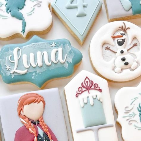 A Lil Something Sweet Custom Cookies on Instagram: "Four the first time in forever ❄️🩵 • • • #bake #baker #cookie #cookies #cookiesofinstagram #cookiedecorating #cookieart #cookiedecorator #birthdaycookies #birthdaycookieset #birthdaycookie #cakecookies #charactercookies #frozencookies #disneycookies #numbercookies #sugarcookies #sugarcookiesofinstagram #sugarcookiedecorating #royalicingcookies #customcookies #designercookies #sandiegocookies #alilsmthsweetcookies #madewithlove" Disney Christmas Cookies Royal Icing, Frozen Sugar Cookies Disney, Frozen Cookies Decorated, Frozen Theme Cookies, Elsa Cookies, Frozen Sugar Cookies, Frozen Cookies Disney, Disney Cookies, Frozen Cookies