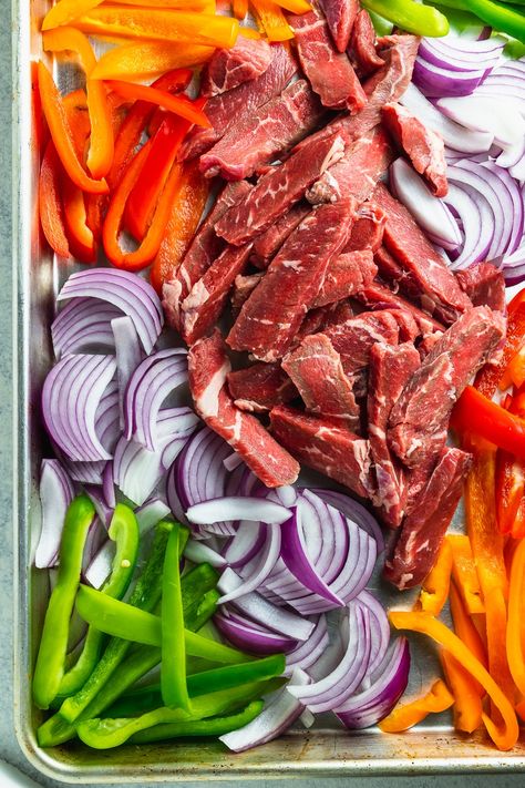 Sheet pan steak fajitas are the weeknight dish that make weeknights a blast! Easy to make, fun to eat, and full of flavor - grab this delicious, fast, and healthy dinner recipe at joeats.net. #joeats #steak #fajitas #sheetpandinner #weeknightdinner Easy Sheet Pan Steak Fajitas, Fajita Pan Sheet, Weeknight Dinner Sheet Pan, One Pan Weeknight Dinners, Steak Fajita Sheet Pan, Sheet Pan Steak Fajitas Sirloin, One Sheet Pan Meals Steak, Fajita For A Crowd, Health Supper Ideas