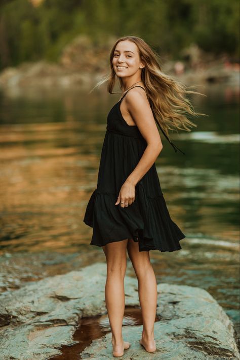 Senior Pictures In Black Dress, Creek Portrait Photography, River Photoshoot Senior Pics, Senior Picture Black Dress, Senior Photos In Creek, Lake Dress Photoshoot, Senior Pictures Rocks, River Graduation Pictures, Black Dress Senior Photos