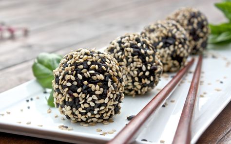 These black rice balls are nutty, slightly smoky, and deliciously umami. Sesame Recipes, Sesame Rice, Sesame Seeds Recipes, Unripe Banana, Sesame Cookies, Spicy Peanut Sauce, Vegetarian Sides, Black Sesame Seeds, Kitchen Black