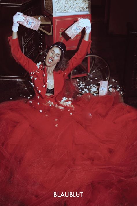 Get the party started with popcorn. Editorial photography by Daniella Midenge.  Image licensing via BLAUBLUT EDITION. Popcorn Photoshoot Ideas, Cinema Photoshoot Ideas, Movie Fashion Editorial, Popcorn Photoshoot, Cinema Shoot, Theater Photoshoot, Cinema Photoshoot, Party Editorial, Red Velvet Sofa