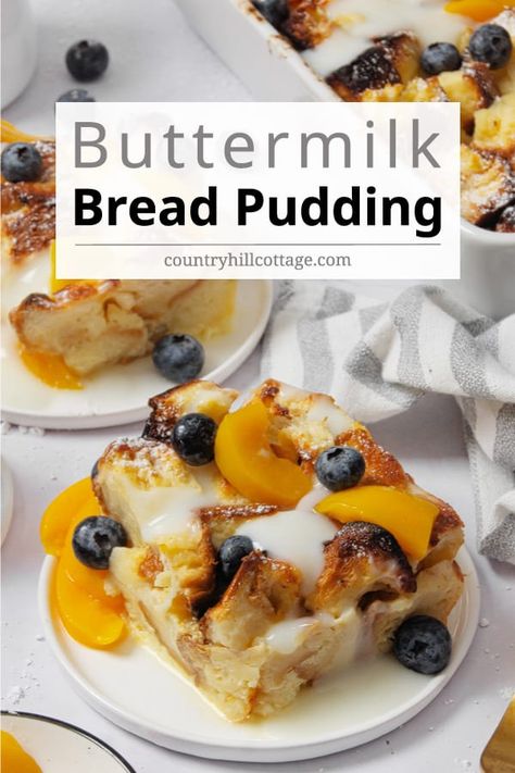 Buttermilk bread pudding is warm, gooey dessert perfection, breakfast and brunch food! Drizzled with a creamy buttermilk custard sauce and fresh fruit, this soft bread pudding is so delicious you won’t want to stop at just one piece. Buttermilk bread pudding is a delicious take on traditional bread pudding. Buttermilk really adds to bread pudding and creates such a delightful, slightly tangy flavor. It’s a great to make-ahead for the holidays and will feed a crowd. | CountryHillCottatge.com Lemon Curd Bread Pudding, Buttermilk Pudding Recipes, Buttermilk Bread Pudding, Bread Pudding With Creme Anglaise, Buttermilk Bread Recipes, French Bread Pudding Recipe, Fruit Bread Pudding, Buttermilk Pudding, Biscuit Bread Pudding