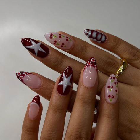 🍒⭐️🍷 • • • • #nailsxkay #nailsnailsnails #apresnails #gelx #gelxnails #prettynails #trendynails #naildesign #nailart #nailextentions #bombnails #cutenails #baddienails #nailinspo #pinterestnails #trendynails #explore #explorepage #scvnails #calinails #LAnails #nailsofinstagram #fallnails #rednails #darkrednails #winenails #starnails #cherrynails #flowernails #crocprintnails Berry Color Nails Designs, Christmas Airbrush Nails, Cool Girl Christmas Nails, Nail Inspo Maximalist, Gel X Nails Christmas, Mixed Design Nails, Canada Nails Designs, Fall And Christmas Nails, Biab Nails Christmas