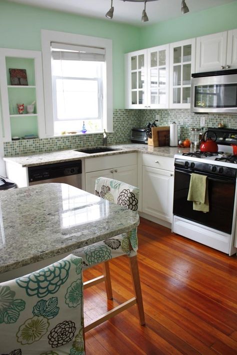 Meg  Dan's Colorful Jamaica Plain Condo Mint Kitchen Walls, Apartment Therapy House Tours, Mint Green Kitchen, Easy Backsplash, Green Kitchen Walls, Mint Kitchen, Boston House, Herringbone Backsplash, Kitchen Walls