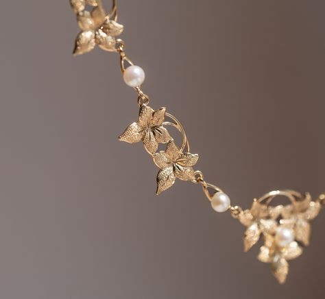 The Golden Eden Necklace 🦢 This dainty yet beautiful vintage Art Nouveau-style floral necklace is truly a rare find. Its intricately detailed flowers & vines alternates between small white pearls. This necklace is the perfect statement piece either worn stand-alone or featured in a layered necklace stack. #vintagenecklace #artnouveau #goldjewelry #uniquenecklace #goldnecklace #vintagejewelry Flowers Vines, Necklace Stack, Floral Necklace, Diy Crafts Jewelry, My Fashion Style, Crafts Jewelry, Layered Necklace, Dainty Necklace, Unique Necklaces