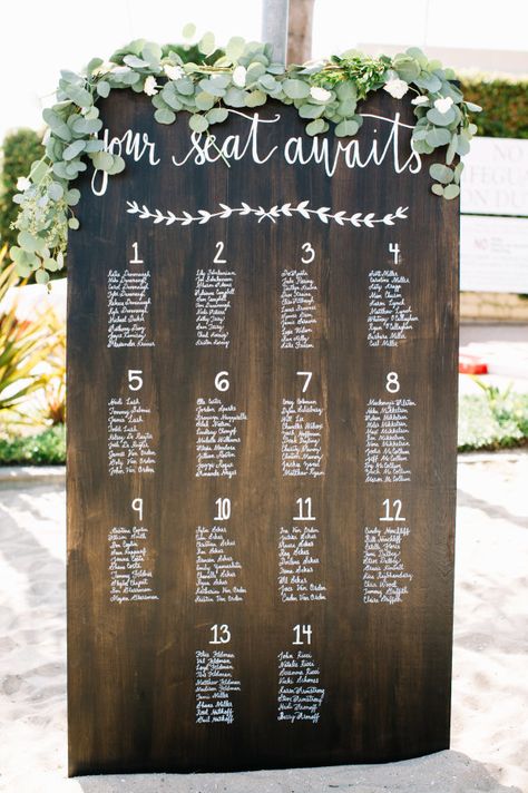 Your seat awaits: http://www.stylemepretty.com/california-weddings/newport-beach/2015/10/23/relaxed-rustic-newport-beach-wedding/ | Photography: Rachel Jane - http://racheljanephoto.com/ Wedding Table Assignments, Rustic Seating Charts, Diy Outdoor Weddings, Rustic Outdoor Wedding, Flowers And Greenery, Outdoor Wedding Decorations, Seating Chart Wedding, Wedding Signage, Wedding Seating