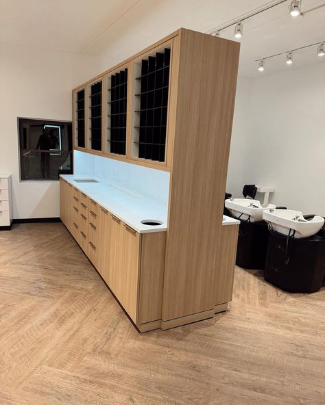 So, so proud of this custom built color bar and shampoo bar. ✨Looking for the perfect custom addition to your salon? DM us today to start your project! #modernsalon #salontoday #hairdresser #hairstylist #hairbrained #behindthechair #dsmdesigns #interiordesign #saloninterior #salondecor #salonlife #salongoals #hairsalondecor #salonequipment #saloninspo #saloninspiration #salonstyle #salon #beautysalon #salonspa #salonfurniture #discoverunder20k #stylist #americansalon #discoverunder50k #salo... Custom Salon Stations, Open Color Bar Salon, Color Bar Ideas Salon, Hair Salon Colour Bar, Salon Color Bar Ideas Storage, Hairdresser Salon Design Interior, Salon Back Bar Ideas, Blow Dry Bar Ideas Salons, Shampoo Area Ideas Salon