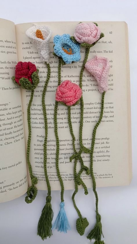 Crochet flower bookmarks Bookmark Flower Crochet, Crochet Pattern For Bookmarks, Crochet Peace Lily, Crochet Bookmarks Flower, Crochet Rose Bookmark Pattern Free, Crochet Book Mark Flower, Crochet Plant Bookmark Free Pattern, Crochet Projects Bookmarks, Crochet Bookmarks Free Patterns Easy Video