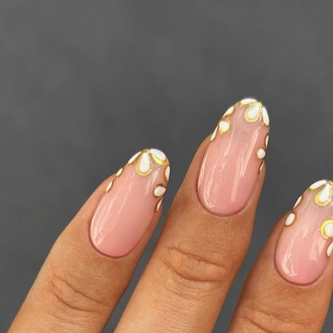 the nailologist🍒🌸🦋🌈✨ on Instagram: "White flowers lined with gold🤍✨ #nailinspo #weddingnails #nails #whitenails #nailart"