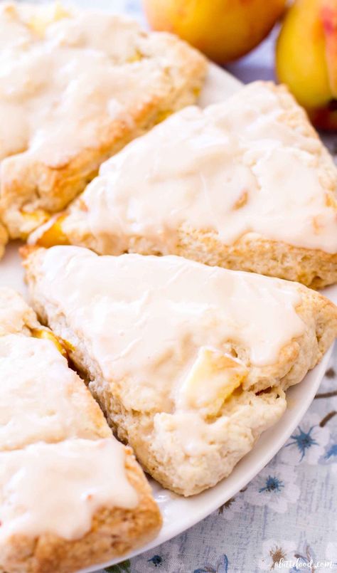 These homemade peach scones are made with fresh peaches! Made from scratch, these flaky scones are topped with a vanilla glaze. This is one of my absolute favorite breakfast recipes, and they make such a kid friendly recipe! #scones #recipe #peach #breakfast Cinnamon Roll Peach Cobbler, Summer Breakfasts, Summer Brunch Recipes, Easy Peach Pie, Peach Scones, Fresh Peach Recipes, Peach Pound Cakes, Peach Dessert Recipes, Scones Recipe Easy