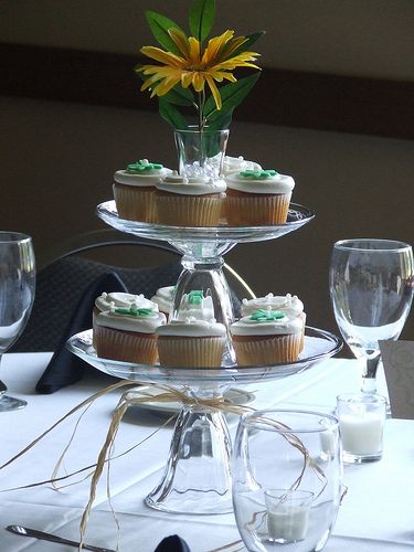 Tiered Cupcake Centerpiece | Flickr - Photo Sharing! Cupcake Centerpieces, Cheap Wedding Table Centerpieces, Bakery Catering, Chocolate Lollies, Cupcake Wedding, Expensive Flowers, Wedding Motifs, Mini Wine Bottles, Cupcake Display