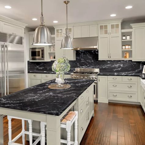 15 Cabinet Colors That Go With Black Granite Countertops | Hunker Dark Granite Countertops Kitchen, Dark Granite Kitchen, Black Granite Countertops Kitchen, Dark Granite Countertops, Black Granite Kitchen, Black Kitchen Countertops, Leather Granite, Classy Kitchen, Dark Countertops