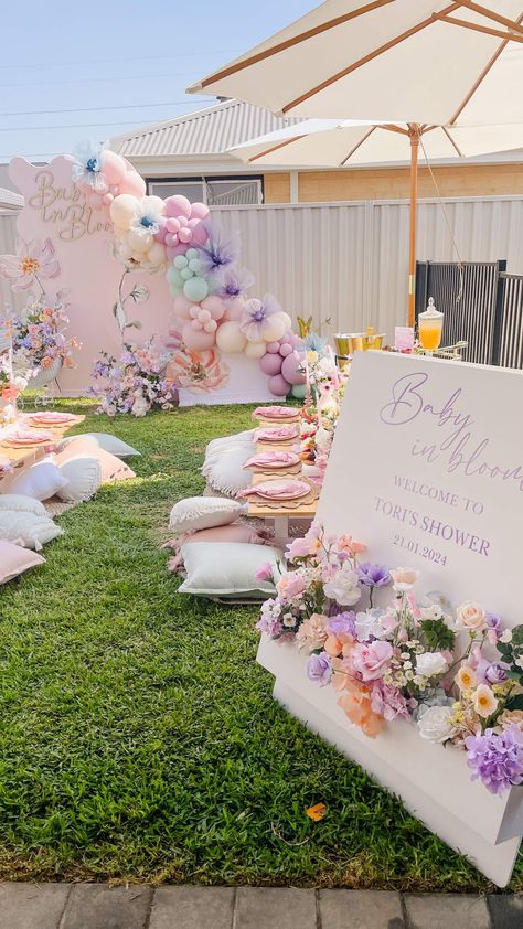 Baby in Bloom | CatchMyParty.com Flowers In Bloom Baby Shower Theme, Spring Flower Baby Shower Ideas, May Flower Baby Shower Theme, Blossom Baby Shower Ideas, Baby Shower Ideas Baby In Bloom, March Theme Baby Shower Ideas, Baby Girl Babyshower, Baby Shower Ideas Flower Theme, Baby Shower Guest Table Set Up