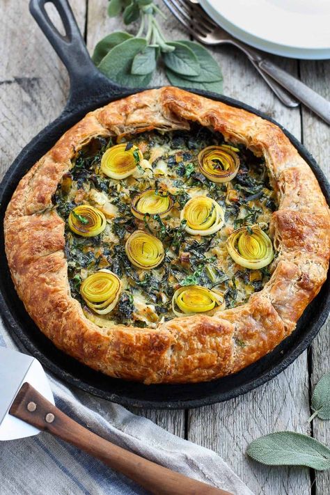 A Savory Galette filled with a luscious mixture of leeks, kale and mascarpone, enclosed in a free-formed, tender, extra flakey crust. #galette #savorygalette #tart #leeks Galette Recipe Savory, Savory Galette, Healthy Spring Recipes, Feasting At Home, Rough Puff Pastry, Night Recipes, Galette Recipe, Leafy Green Salads, Sauteed Kale