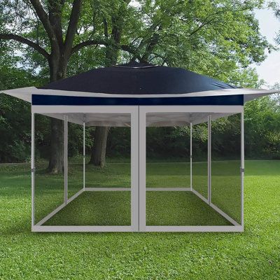 Outdoor gazebo pop-up canopy tent extra shade including sliding all around mosquito netting wall, with a durable frame, 4 sandbags, wheeled bag - easy set-up and folding commercial instant canopy for patio or camping or deck or garden. Roof Color: Navy/Gray | casualstay 12 Ft. W X 12 Ft. D Steel Pop-Up Canopy Metal / Steel / Soft-top in Gray, Size 107.0 H x 144.0 W x 144.0 D in | Wayfair Steel Storage Sheds, Shade Tent, Outdoor Gazebo, Grill Gazebo, Bubble Tent, Canopy Frame, Instant Canopy, Pop Up Canopy Tent, Gazebo Canopy