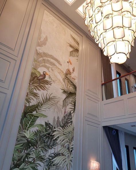 Staircase Wall Wallpaper Ideas, Tropical Wall Art Living Room, Jungle Wallpaper Stairs, Wallpaper For Double Height Wall, Accent Walls High Ceilings, Double Height Accent Wall, Double Height Wall Decor, Wallpaper Stairs Wall, High Ceiling Wall Design