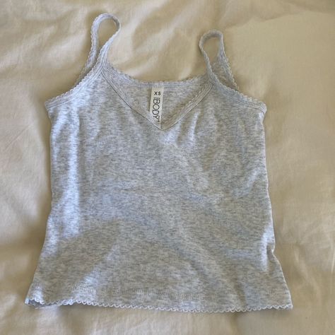 The Cutest Softest Heather Grey V Neck Tank. Brand New Never Worn But I Ripped Off The Tags When I Tried It On So I Wasn’t Able To Return It :( Message Me With Any Questions! Cheap Fitted Gray Tank Top, Trendy Gray Tank Top, Cheap Basic Gray Tank Top, Gray Cotton Tank Top, Gray Fitted Cami Tank Top, Yellow Halter Top, Yellow Tank Top, Black Seamless, Tank Top Outfits