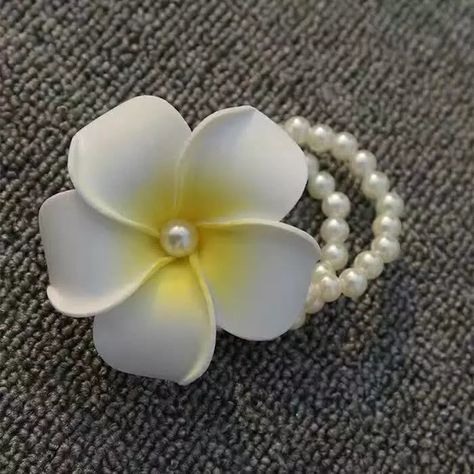 white frangipani with pearl bracelet/ Frangipani bracelets necessary accessories sand beach resort pearl White Frangipani, Flower Headband, Beach Resort, Beach Sand, Flower Crafts, Boutonniere, Flowers In Hair, Pearl Bracelet, Air Dry