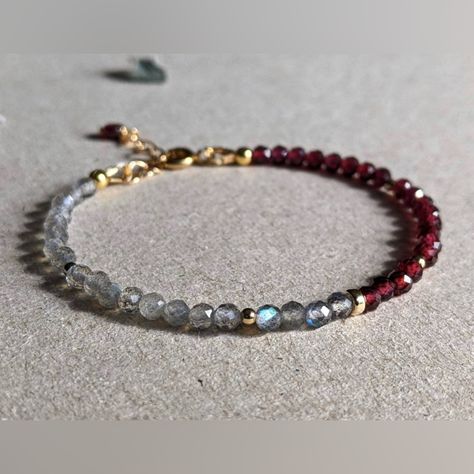 P R O D U C T D E T A I L S - This Dainty Bracelet Features Half Misterious Labradorite And Half Intense Deep Red Garnet Accompanied With 14 Karat Gold Filled Beads And Other 14 Karat Gold Filled Settings. The Beads Are About 3.5 Mm, A Very Light And Elegant Bracelet. - Bracelet Size Is 7” Inches Plus 1” Inch Extender Chain. (Custom Length Is Available). - This Bracelet Is Also Made To Order In Sterling Silver. - Minimalist Design, Handcrafted By Us In Pennsylvania , Usa. - Garnet Is The Officia Gray Beaded Bracelet, Elegant Beads Bracelet, Gemstone Bracelet Ideas, Grandidierite Jewelry, Gemstone Bracelets Ideas, Gem Bracelets, Stone Bead Bracelets, Broken Bonds, Precious Stones Bracelet