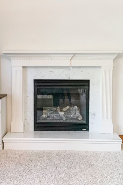 Peel And Stick Fireplace Makeover, Peel And Stick Tile Fireplace, Peel And Stick Fireplace, Dark Fireplace, Easy Fireplace, Fireplace Transformation, Carrara Marble Backsplash, Colonial House Interior, Peel And Stick Wall Tiles