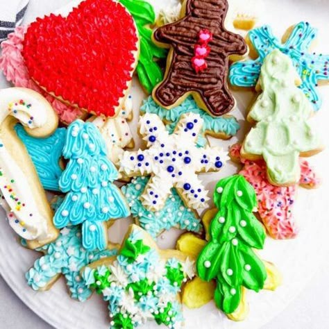 Buttercream Frosting for Cookies (That Hardens!) - Midwestern Holidays Frosting For Christmas Cookies, Cut Out Cookie Frosting, Christmas Treat Tray, Buttercream Frosting For Cookies, Best Sugar Cookie Frosting, Hard Cookie Icing, Easy Sugar Cookie Frosting, Frosting For Cookies, Cookie Icing That Hardens