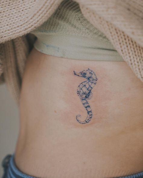 Tiny seahorse inspired by a previous flash for @grainneroisin 🌊 Had SO much fun with this piece and am now deeply obsessed with blue tattoos 😩 . . . #seahorse #seahorsetattoo #bluetattoo #ribtattoo #seahorses #seahorsetattoos #lafemmemelbourne #melbournetattoostudio #melbournetattoos #tattooartists #juniortattooartist #tattooportfolio #lafemme #southmelbourne #melbournetattoo #melbournetattooist #inked #ink #tats #melbournetattooartist #fineline #finelinetattoo #finelinetattoos #calmyourtats... Tattoo Ideas Seahorse, Tiny Seahorse Tattoo, Simple Seahorse Tattoo, Small Seahorse Tattoo, Sea Horse Tattoos, Sea Horse Tattoo, Physical Aesthetic, Blue Tattoos, Heart Tat