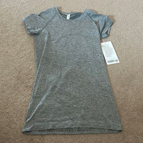 Brand New Swiftly Tech In The Color Grey, Size 6, Bought Wrong Size And Have Never Worn Grey Swiftly Tech, Lululemon Gray Swiftly Tech, Long Sleeve Swiftly Tech, Lululemon Swiftly Tech Long Sleeve Grey, Lululemon Swiftly Tech 2.0 Shirt, Lululemon Swiftly Tech Short Sleeve, Lululemon Swiftly Tech, Swiftly Tech Short Sleeve, Lululemon Athletica