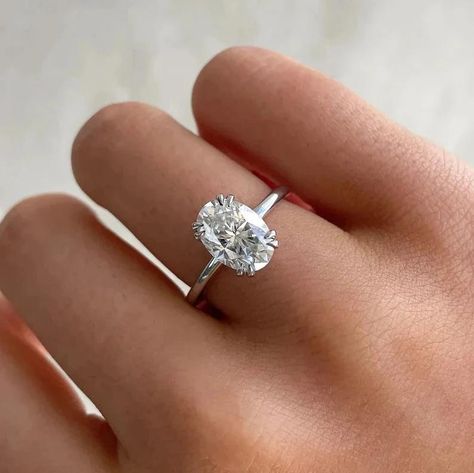 2.00 ct Oval Cut Moissanite Engagement Ring, Unique Double Claw 4 Prongs, Solitaire Ring, Dainty Wedding Ring, Pretty Ring, Hidden Halo ✤Material Details✤ ⇒Base Metal: Sterling Silver ⇒Metal Purity: 925 ⇒Stamping: S925 ⇒Plating Option: White Gold, Yellow Gold, Rose Gold ✤Diamond Details✤ ⇛𝐃𝐞𝐭𝐚𝐢𝐥𝐬 𝐨𝐟 𝐦𝐚𝐢𝐧 (𝐜𝐞𝐧𝐭𝐞𝐫) 𝐬𝐭𝐨𝐧𝐞 ⇒Type of Diamond: Moissanite/Cubic Zirconia ⇒Size: 9.00x7.00 mm ⇒Weight: 2.00 ct ⇒Shape: Oval ⇒Color: D (White/colorless) ⇒Clarity: VVS1 ⇒Cut: Excellent ⇒B Oval Silver Moissanite Ring, Oval White Gold Engagement Ring, Oval Engagement Ring Silver, Silver Oval Engagement Ring, Silver Engagement Rings Round, Silver Solitaire Engagement Ring, Oval Solitaire Ring, Ring Hidden Halo, Dainty Wedding Ring