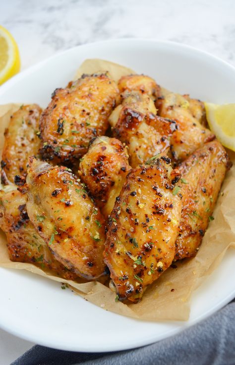 Eecipe developer Joe Dillard isn't sticking to a simple dry rub. Instead, he adds a honey glaze to create what he calls "a flavor-packed dish that highlights a variety of complementary flavors" and packs depth into each bite. #ChickenWings Lemon Pepper Chicken Bites Air Fryer, Air Fryer Lemon Pepper Wings, Lemon Pepper Chicken Tenders Air Fryer, Honey Lemon Pepper Wings Air Fryer, Airfryer Chicken Wings Lemon Pepper, Lemon Pepper Chicken Wings, Lemon Pepper Wings, Lemon Pepper Chicken, Chicken Bites