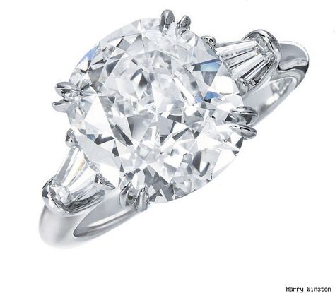 The ring, a cushion-cut 8 carat diamond in a tapered baguette platinum setting, is classic Harry Winston as it embodies timeless elegance. Harry Winston Ring, Harry Winston Engagement, Cushion Cut Wedding Rings, Cushion Cut Diamond Ring, The Bling Ring, Cushion Engagement Ring, Chuck Bass, Cushion Cut Ring, Harry Winston